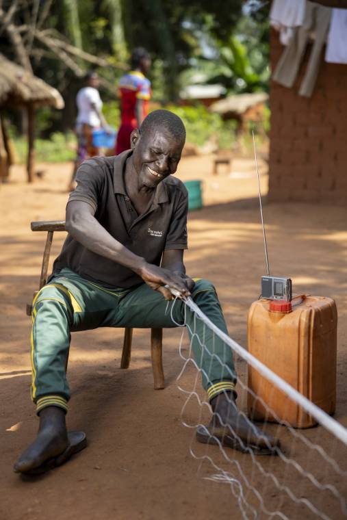 Alexis Baranissa, 58, listens to radio Zereda and Radio Ndeke Luka in Obo, in the south-east of the Central African Republic. Alexis has a leg injury that makes it difficult for him to move around. He says that radio &quot;brings him joy&quot;.