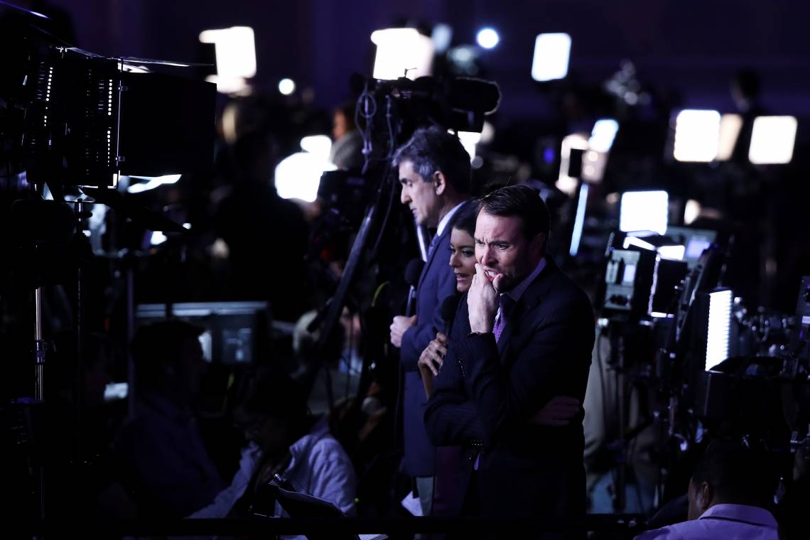 Broadcast media journalists stand ahead of Republican presidential nominee Donald Trump’s election night event at the New York Hilton Midtown on November 8, 2016 in New York City.