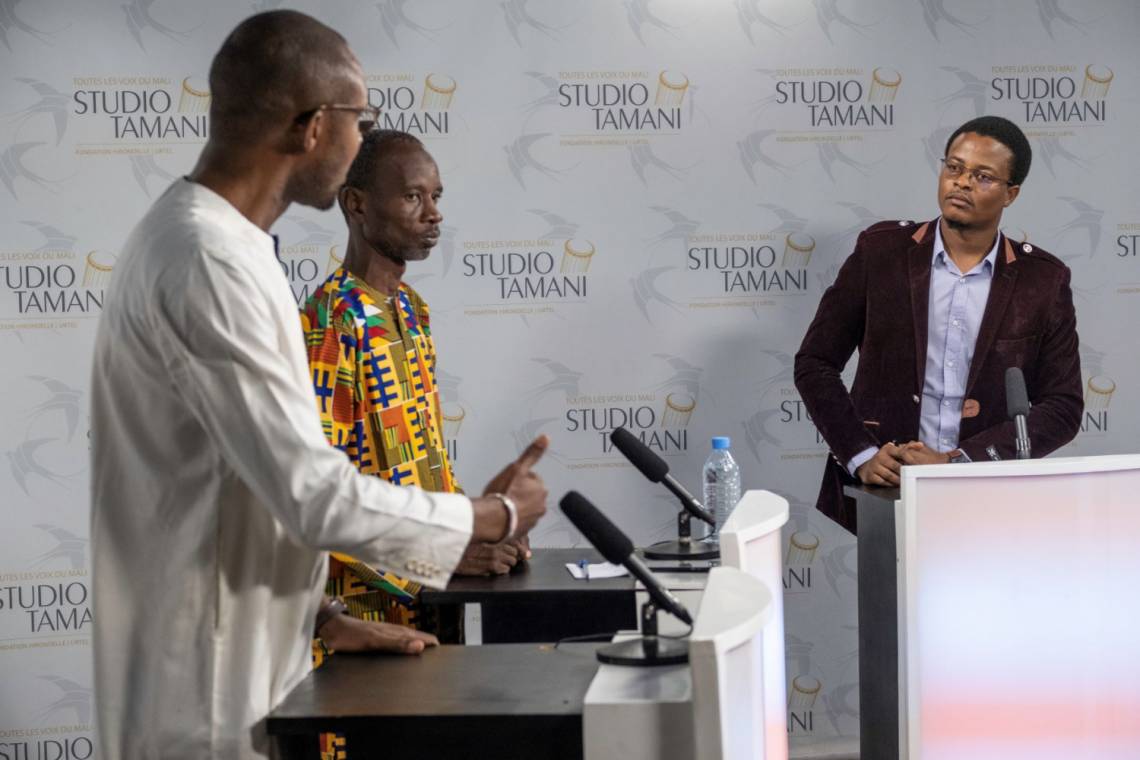 Mouhamadou Touré (right) hosts a live debate at Studio Tamani in Bamako.