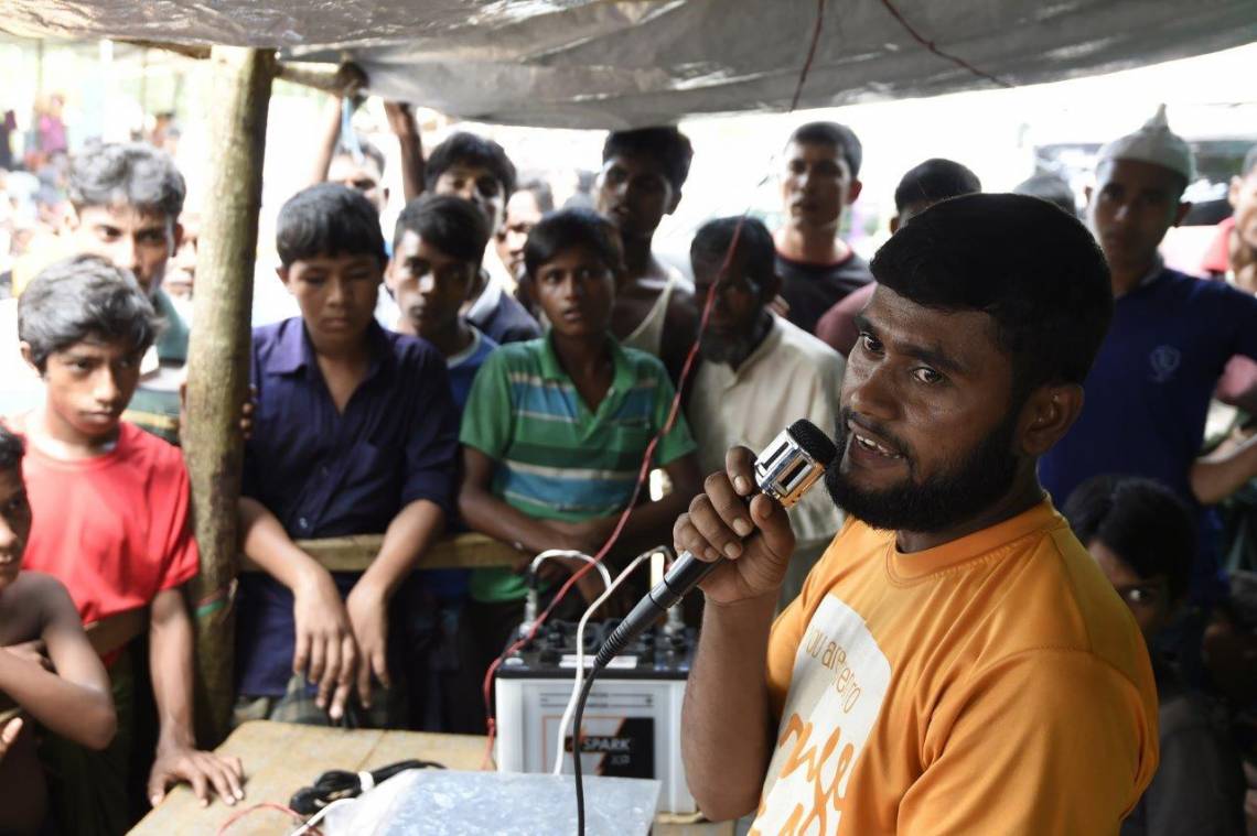 A Rohingya refugee broadcasts messages about people who got lost in Kutupalong camp in Bangladesh in September 2017.