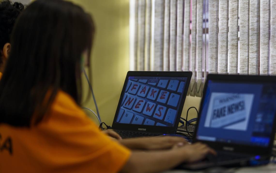 Students attend a course on “Fake News: Access, Security and Vearcity of Information”, in Sao Paulo, Brazil, in 2018.