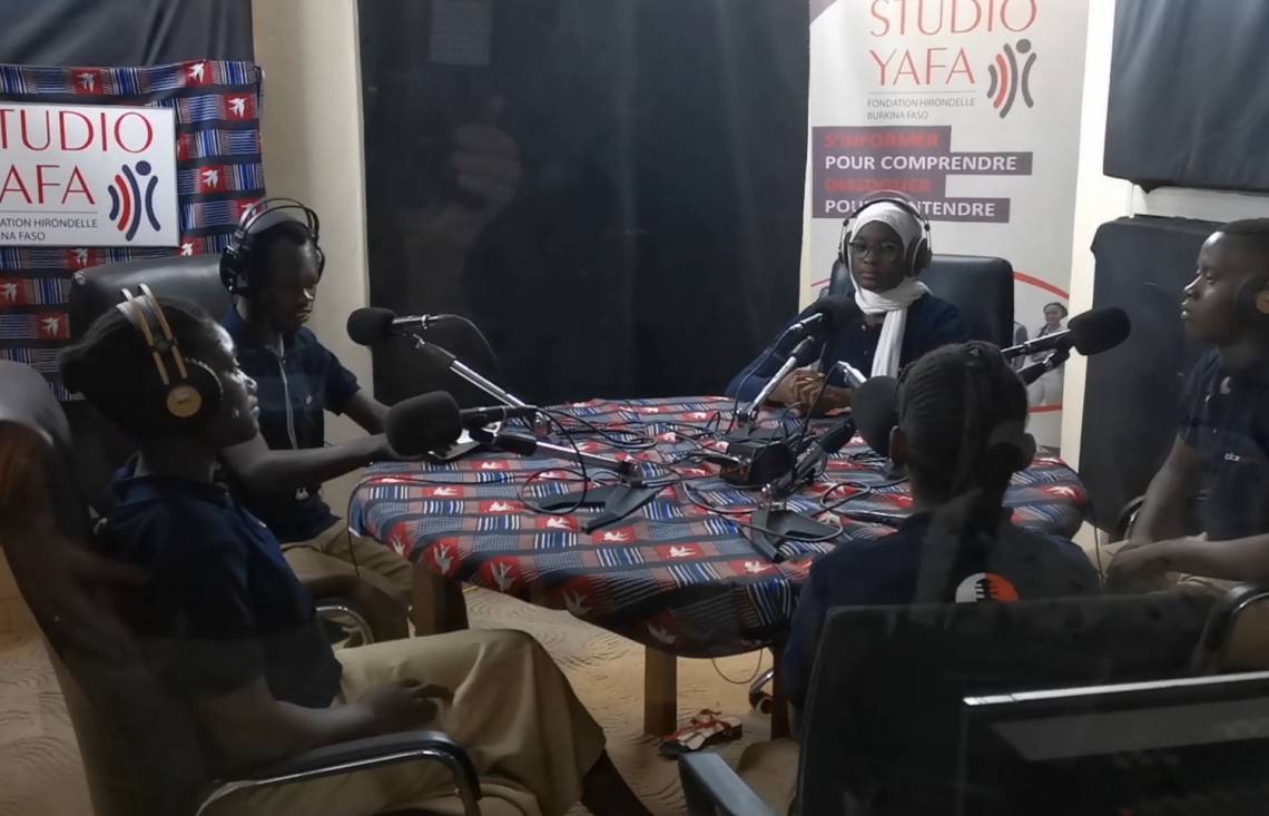 Radio debate exercise with young high school students in the main studio of Studio Yafa in Ouagadougou.