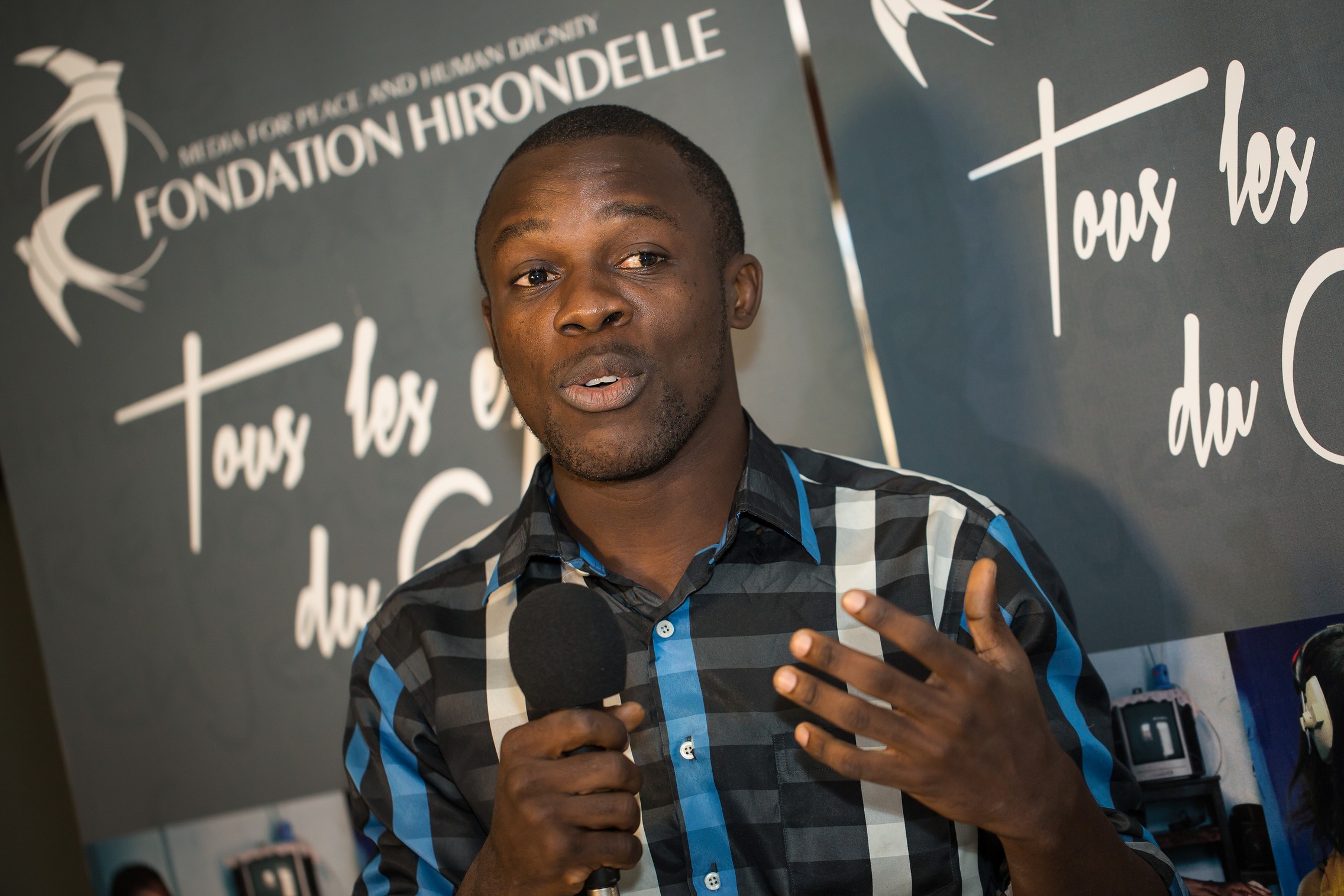 Participation d’une jeune congolais à un débat « Jeunes et élections » organisé par la Fondation Hirondelle en RDC. © Fondation Hirondelle / Catherine Trautes